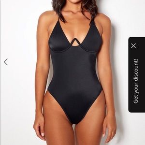 Brand new Gooseberry one piece. Black and very slimming. Really sucks you in!